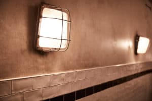 Concrete wall with tiles and lighting