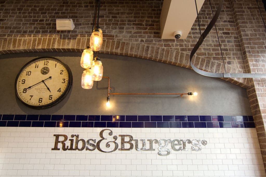 Ribs & Burgers Signage with wall clock and lighting